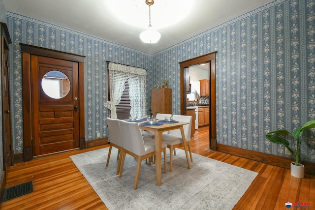 dining room featuring wood-type flooring