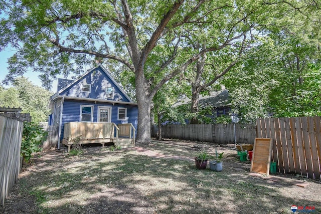 exterior space featuring a wooden deck