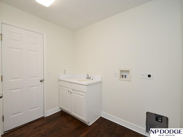 laundry room with hookup for an electric dryer, sink, hookup for a washing machine, and dark wood-type flooring