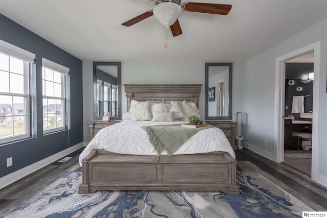 bedroom featuring ceiling fan and dark hardwood / wood-style floors