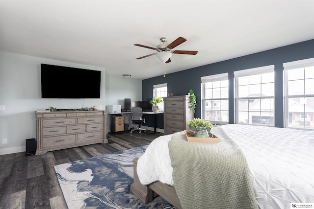 bedroom featuring dark hardwood / wood-style floors and ceiling fan