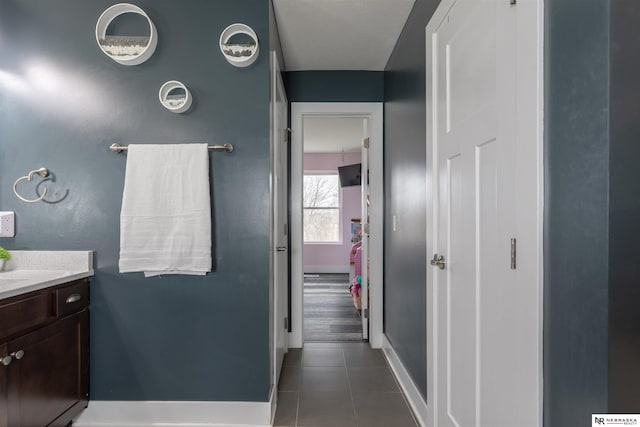 bathroom featuring tile patterned floors and vanity