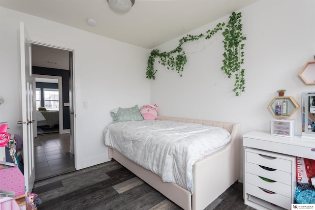 bedroom featuring dark hardwood / wood-style floors