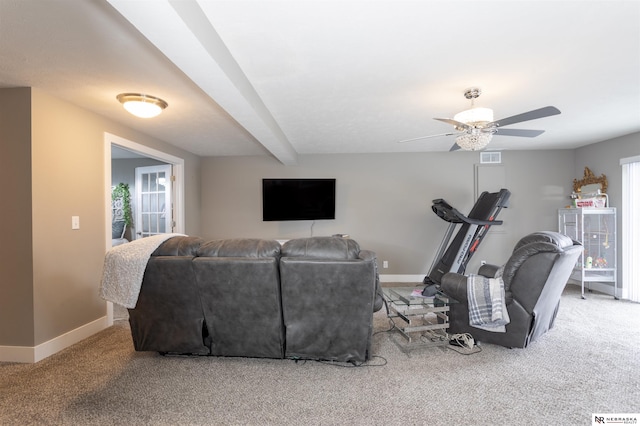 workout room with carpet and ceiling fan