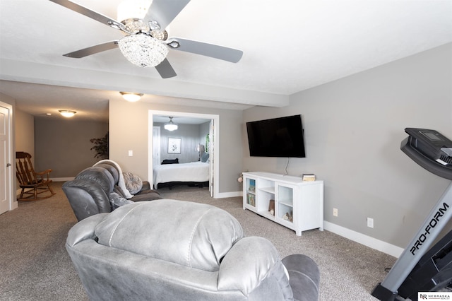 carpeted living room with ceiling fan