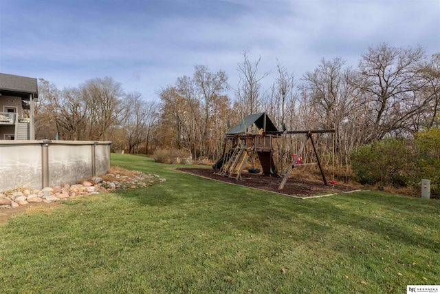 view of yard with a playground