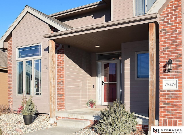 property entrance with a porch