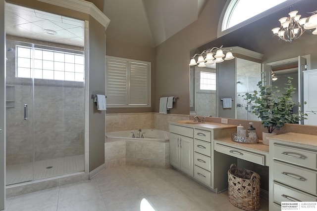 bathroom with tile patterned floors, vanity, a notable chandelier, plus walk in shower, and lofted ceiling