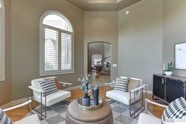 living area featuring hardwood / wood-style flooring and plenty of natural light