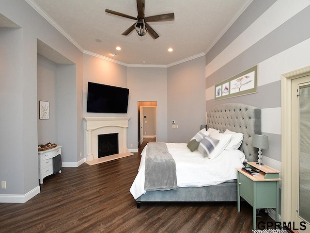 bedroom with ceiling fan, crown molding, and dark wood-type flooring