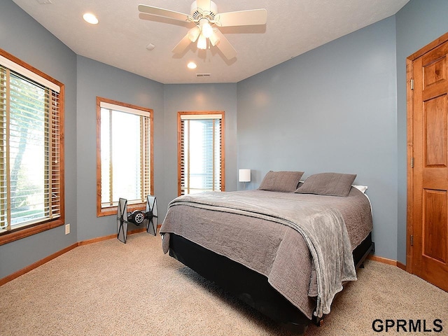 bedroom featuring carpet and ceiling fan