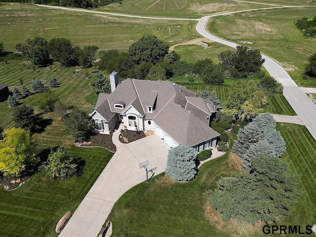 birds eye view of property featuring a rural view