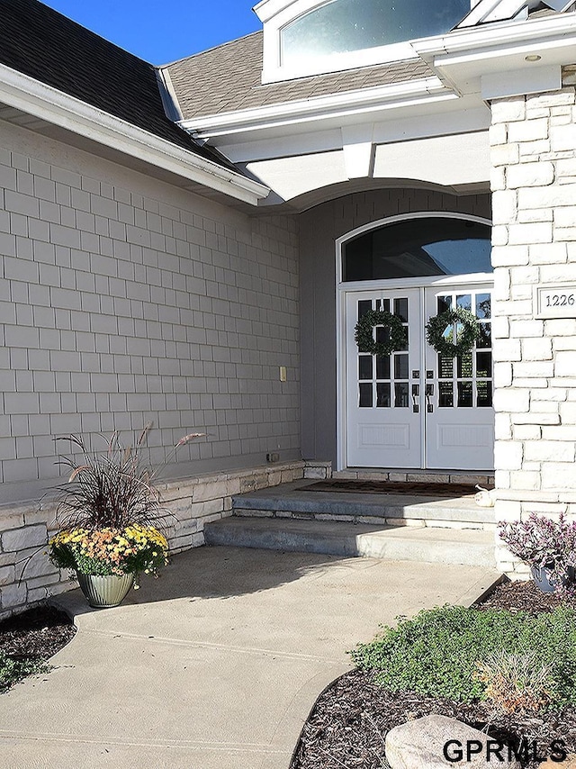 doorway to property featuring french doors