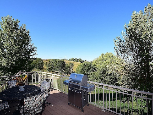 wooden deck with area for grilling