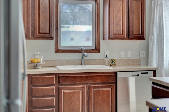 kitchen with dishwasher and sink