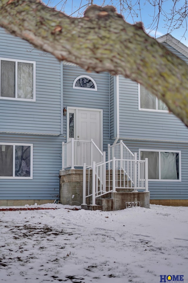 view of snow covered property