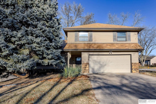 view of front of home with a garage