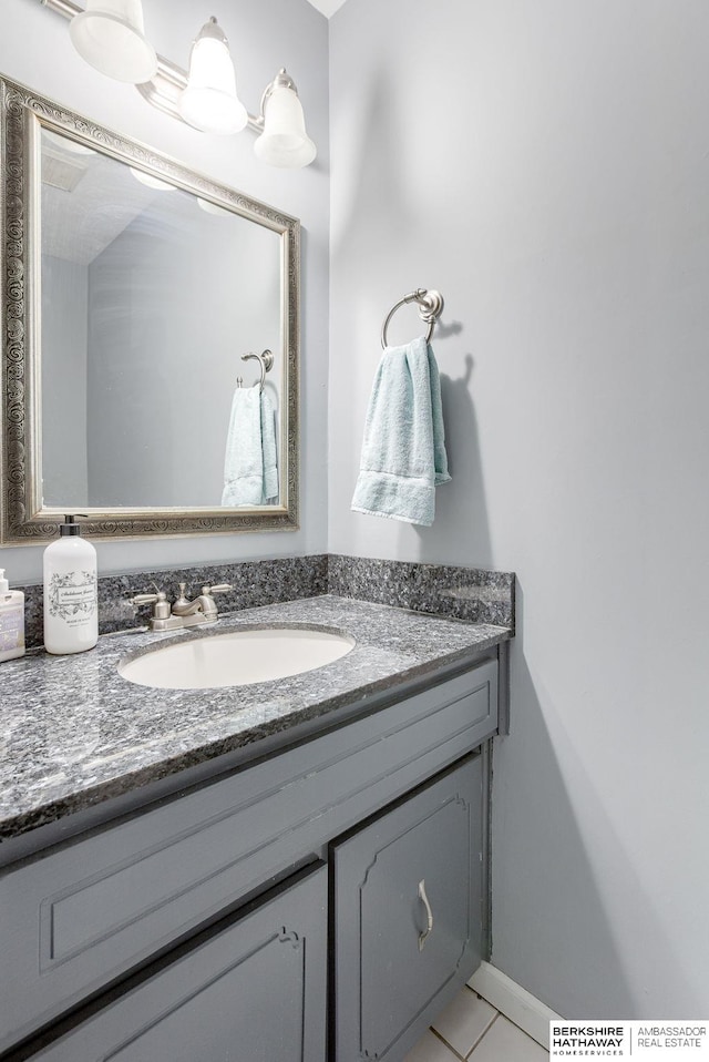 bathroom with vanity and tile patterned floors