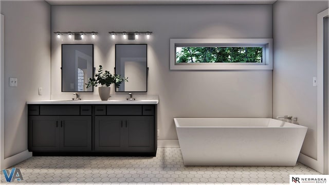 bathroom with a tub to relax in, vanity, and tile patterned flooring