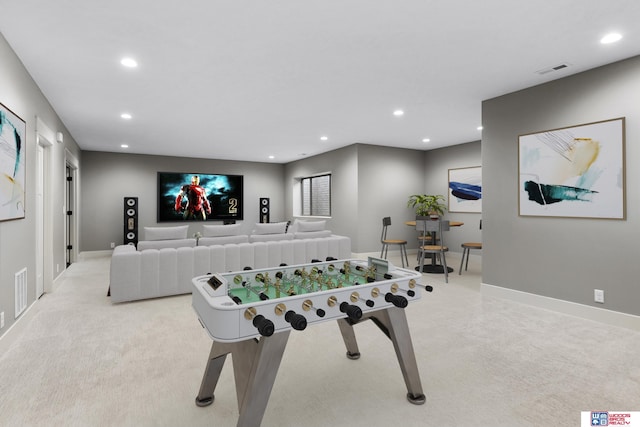 game room with light colored carpet