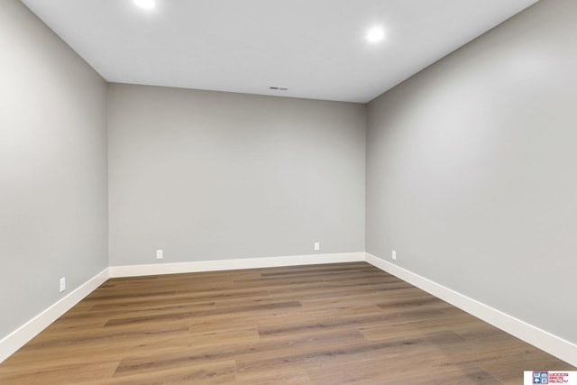 empty room featuring hardwood / wood-style floors