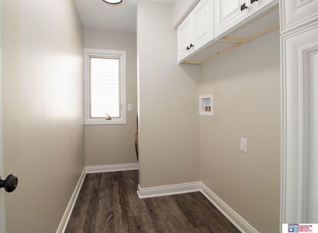 washroom with cabinets, hookup for a washing machine, and dark hardwood / wood-style floors