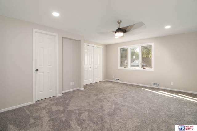 unfurnished bedroom featuring carpet flooring and ceiling fan