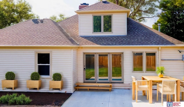 rear view of house featuring a patio