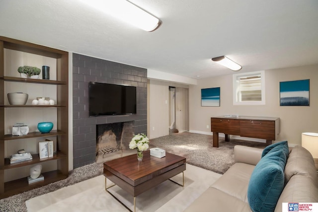 living room featuring light colored carpet and a fireplace