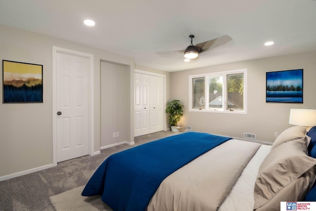 carpeted bedroom featuring ceiling fan and a closet