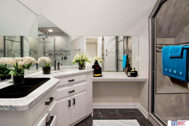 bathroom featuring vanity and walk in shower