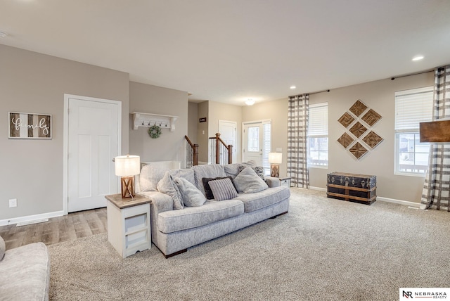 living room featuring light colored carpet