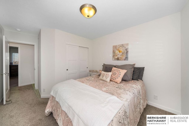 bedroom with carpet floors and a closet