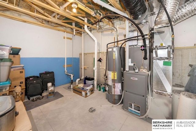 utility room featuring gas water heater and heating unit