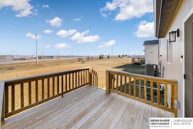 deck with cooling unit and a rural view