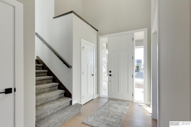 entrance foyer with light hardwood / wood-style floors