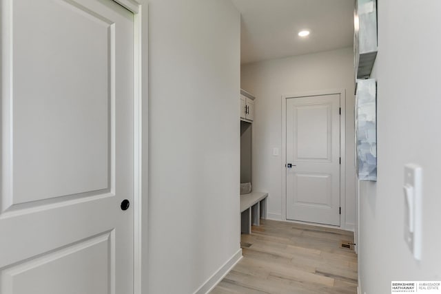 mudroom featuring light hardwood / wood-style floors