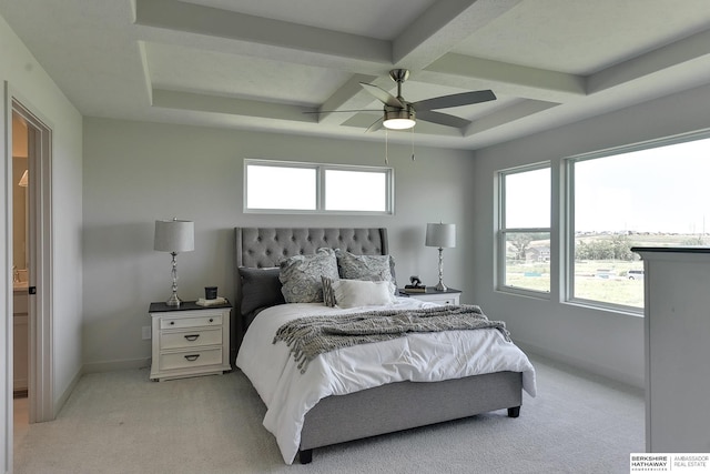 carpeted bedroom featuring ceiling fan, beam ceiling, and coffered ceiling