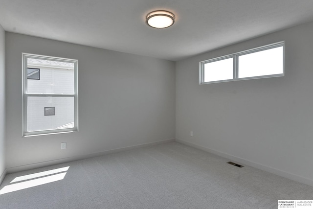 view of carpeted spare room