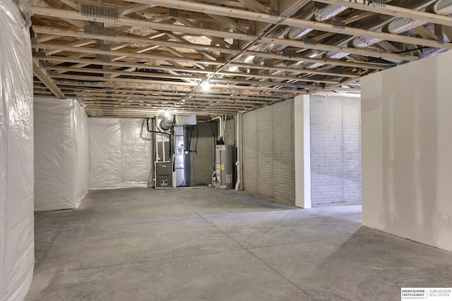 basement with heating unit and water heater