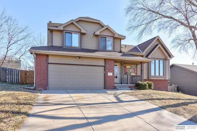 view of front of property with a garage and a porch