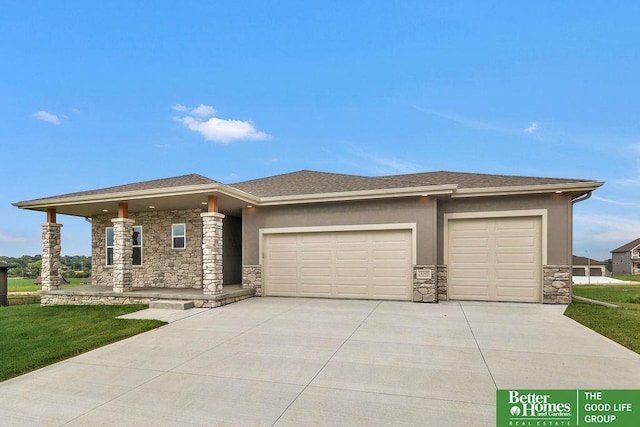 prairie-style home featuring a garage