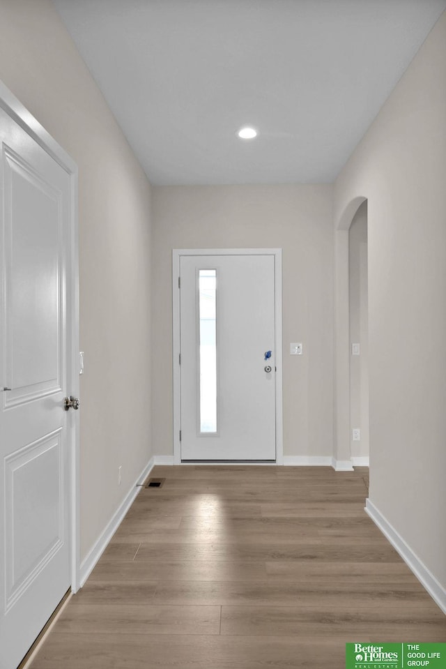 foyer entrance featuring light wood-type flooring