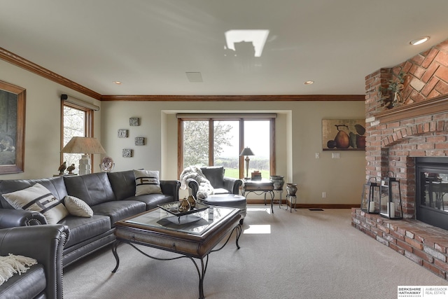 living room with plenty of natural light, carpet, and ornamental molding