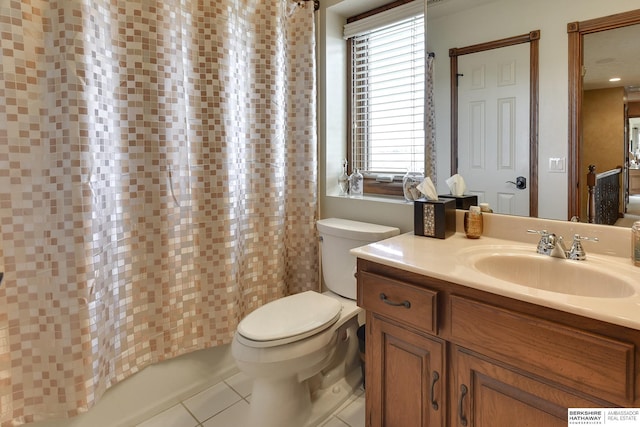 full bathroom with toilet, vanity, tile patterned floors, and shower / tub combo with curtain