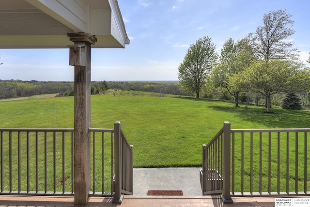 view of yard with a rural view