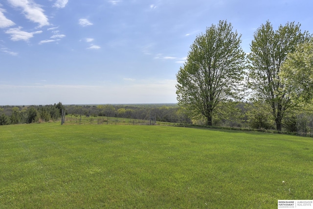 view of yard with a rural view