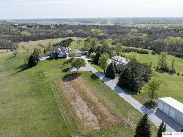 birds eye view of property featuring a rural view