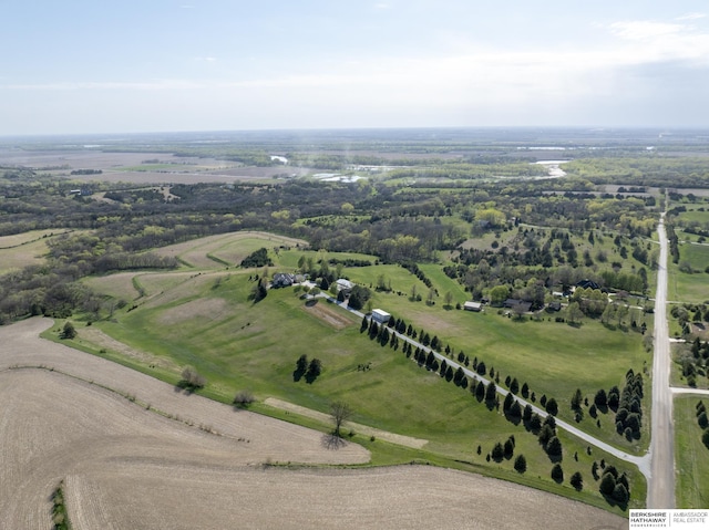 birds eye view of property featuring a rural view