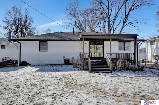 view of snow covered house